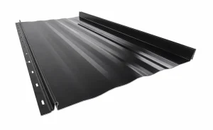 Standing seam panel seen at an angle, showing the striated pan, the snap-lock seam and the nailing flange